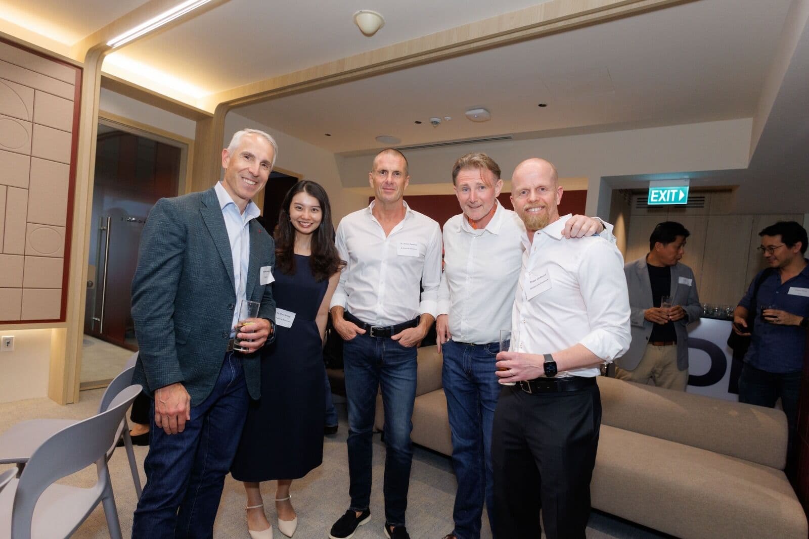 Roger Olofsson (right) with guests at the networking reception after the programme