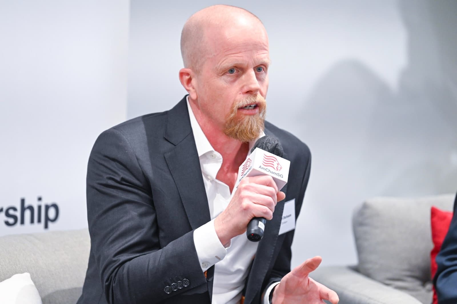 Roger Olofsson, Founder & CEO of Olofsson, speaking on the Mythos & The Curated Frontier panel at AmCham Singapore