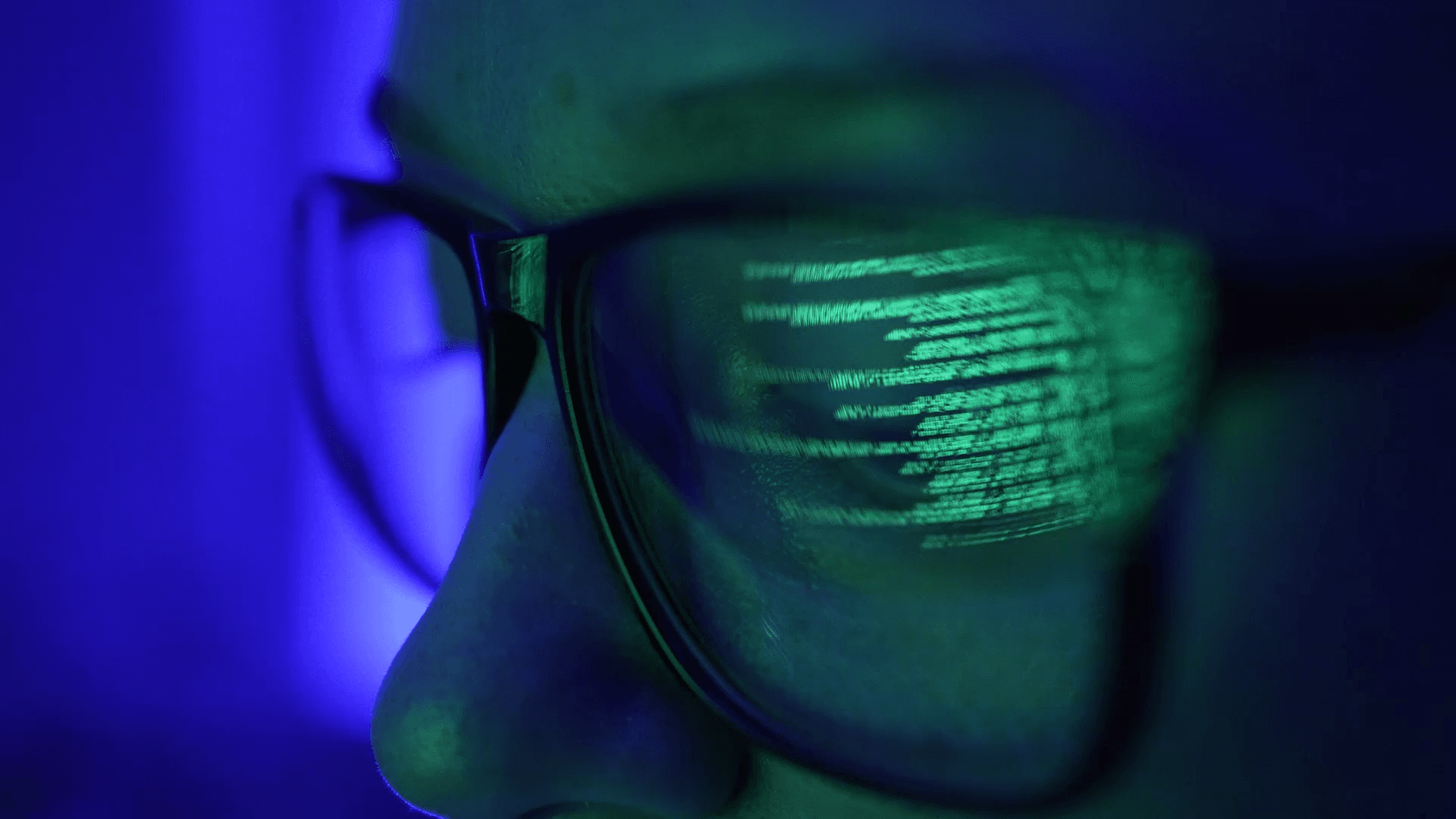 Code reflected in glasses, representing AI-native work